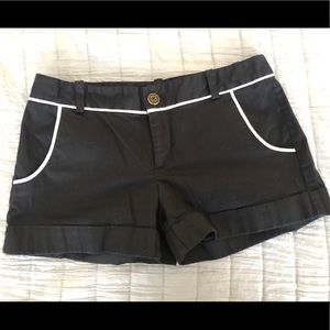Black shorts with white piping